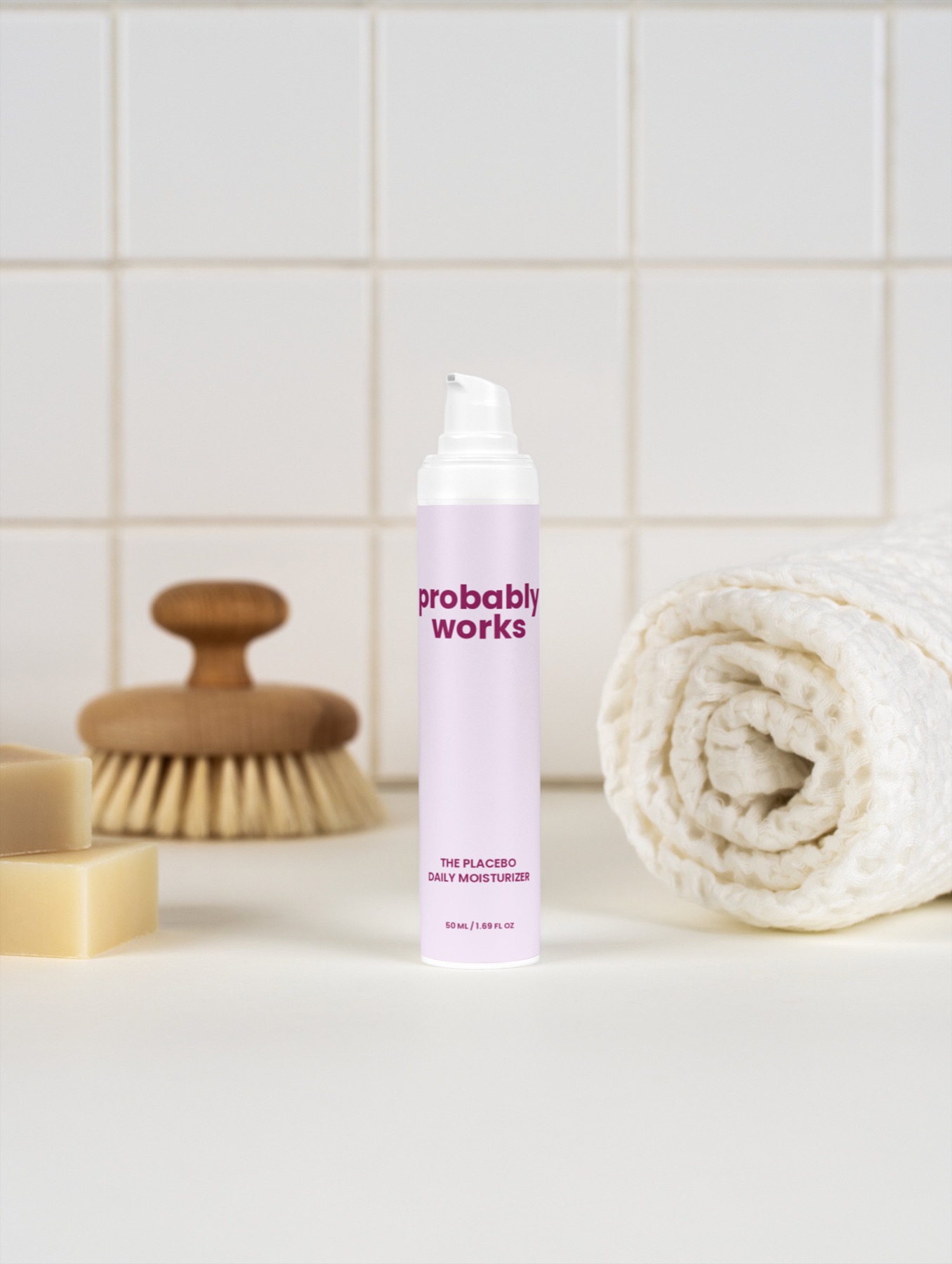 Bottle on a bath shelf near white tile